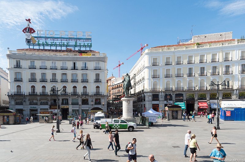 20160606_174836 D4S (1).jpg - The Tio Pepe has been a landmark in Peurta del Sol, the famous Madrid square.  Since 1936 it was atop number 1, and in 2009 it was granted a pardon to remain atop the building in perpetuity.  Come 2012 and Apple renovates the building for its new store and in the process the Tio Pepe sign was taken down.  Three years later (2014) it was relit at number 11, its current home.